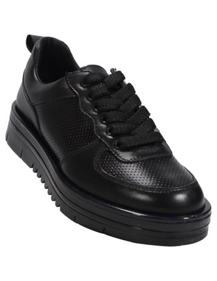 Zapato Coqueta de piel para niña