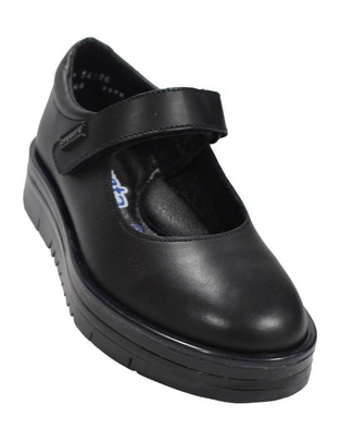 Zapato Coqueta de piel para niña